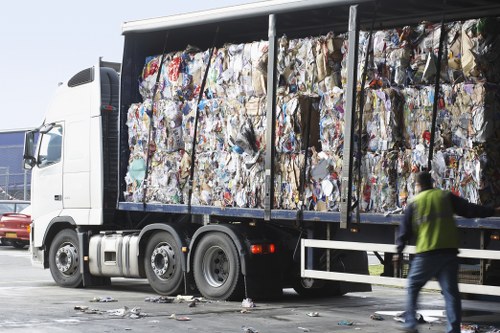 Garden waste being collected by professionals in Enfield.